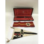 A replica Third Reich dagger and pennant plus a na