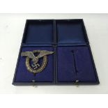 A German WW2 Luftwaffe pilots badge in copy box, a