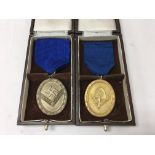 A pair of German WW2 service medals comprising of