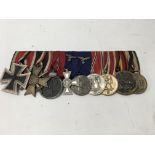 A strip of 8 WW2 medals including the German iron