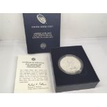 A 2013 Burnished Uncirculated one ounce Silver (9.99%) American Eagle Dollar. Designed by Adolph A