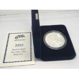 A Silver 2010 Proof American silver (9.99%) dollar in a fitted box West Point Mint. Designed by