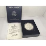 A 2011Burnished Uncirculated one ounce Silver (9.99%) American Eagle Dollar. Designed by Adolph A