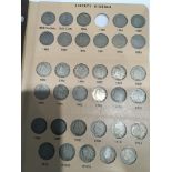 An Album containing Barber Liberty Nickels from 1883-1912-S. Missing 1885. With a further page of