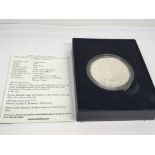 A 2007 Burnished Uncirculated one ounce Silver (9.99%) American Eagle Dollar. Designed by Adolph A