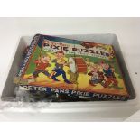A box containing vintage jigsaw puzzles - NO RESER