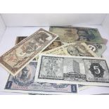 A collection of world bank notes all used. Circula
