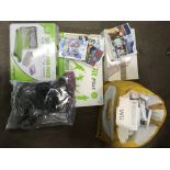A boxed Nintendo Wii and WiiFit Plus with various