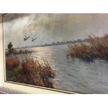 A framed oil on canvas depicting ducks flying over