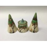 A Clarice Cliff three piece cruet set decorated wi