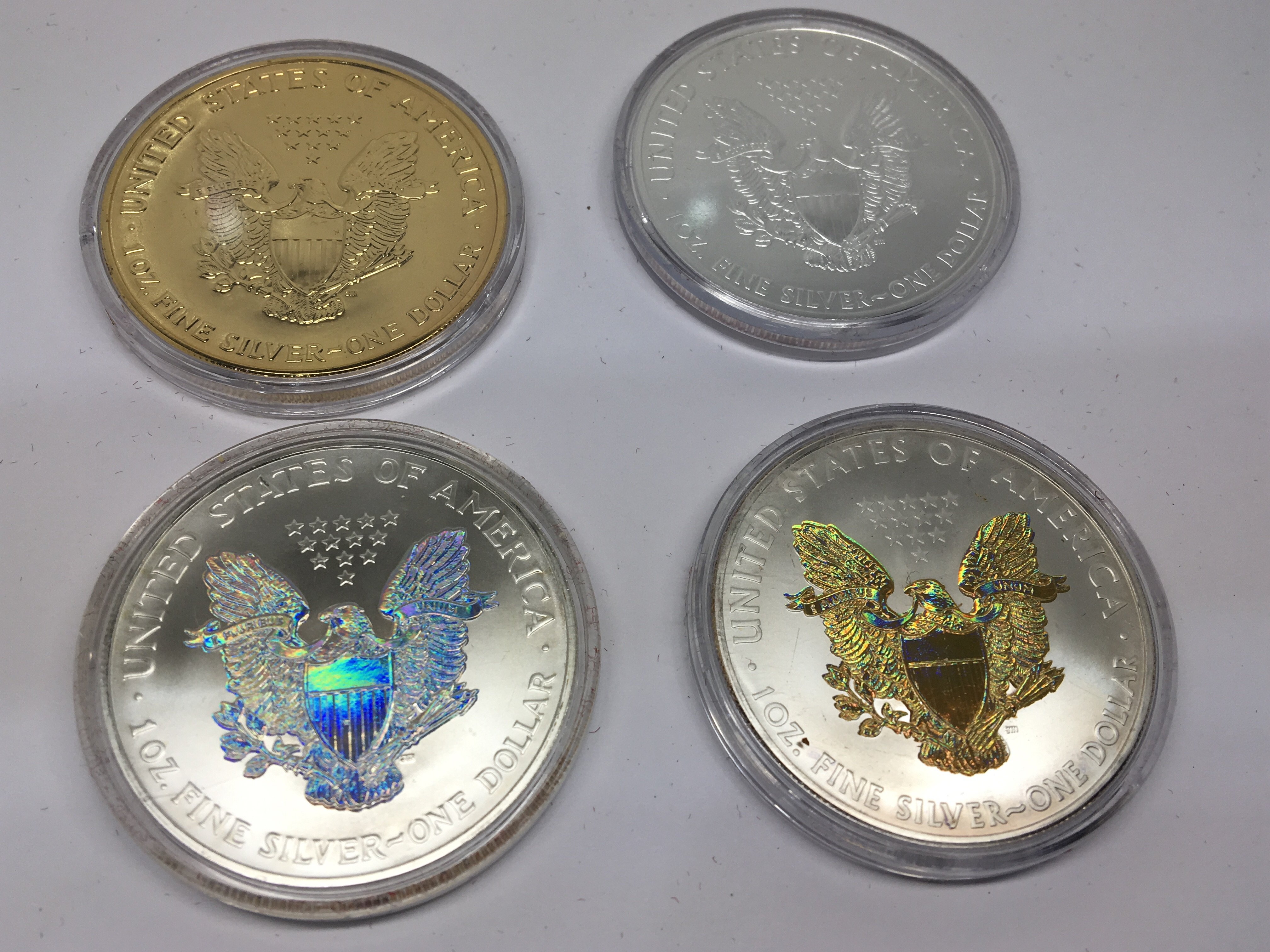 A collection of four American Themed Silver Dollar - Image 2 of 2