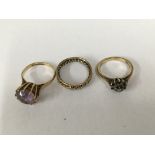 Three rings including 9 ct