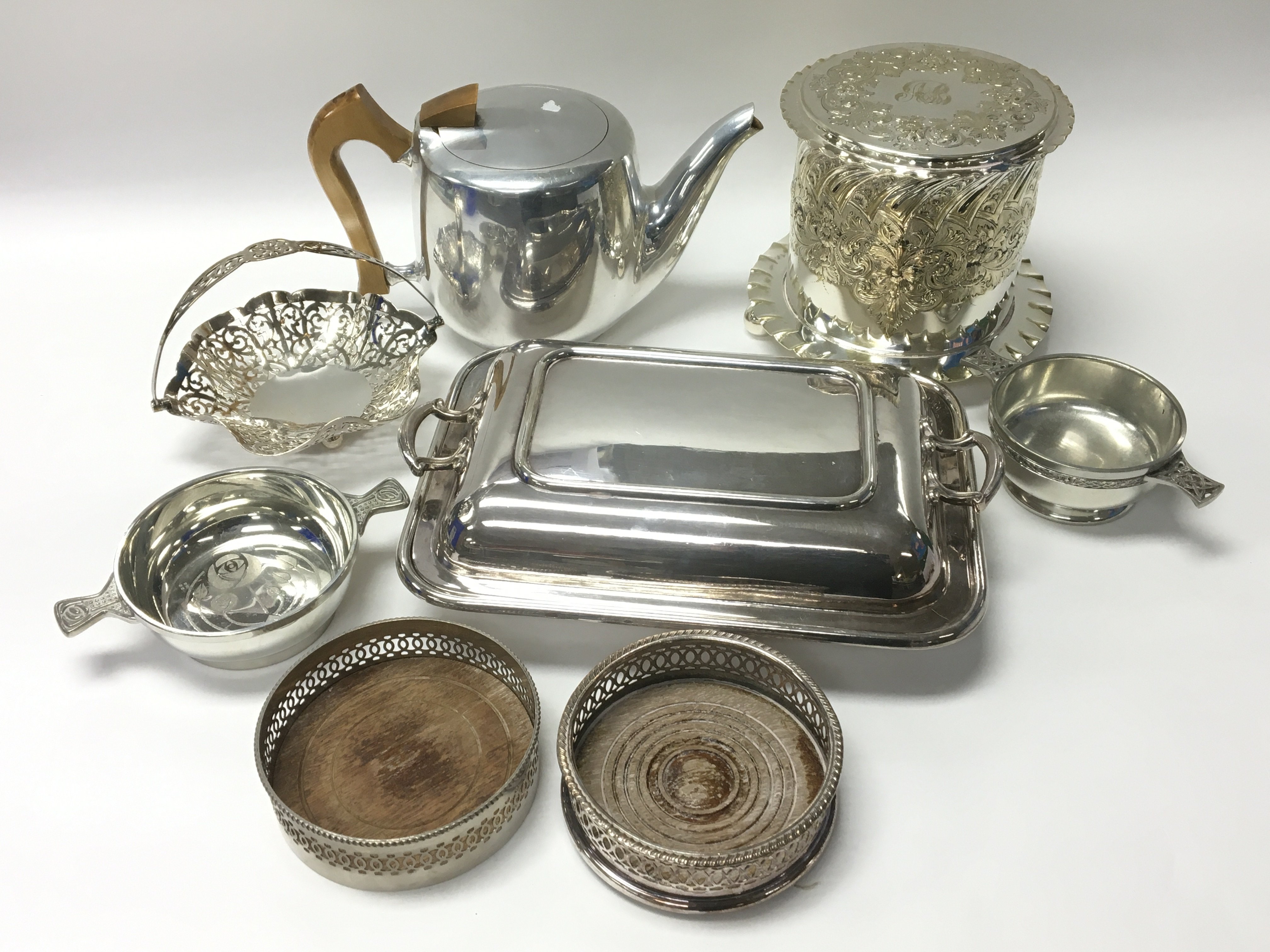 A silver plated biscuit barrel and other silver pl