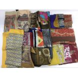 A collection of fifteen Liberty scarves and a purs