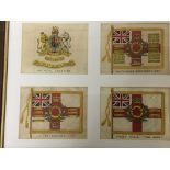 Four silks each with the flag or coat of arms of British Regiments. each flag 13x10cm.