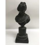 A Victorian spelter or cast metal bust of a lady a