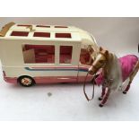 A Barbie caravan and a Sindy horse , un boxed