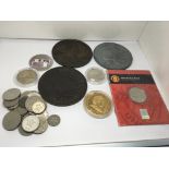 A collection of coins including enlarged retrospec