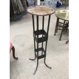 A wrought iron and copper stand, approx 92cm.