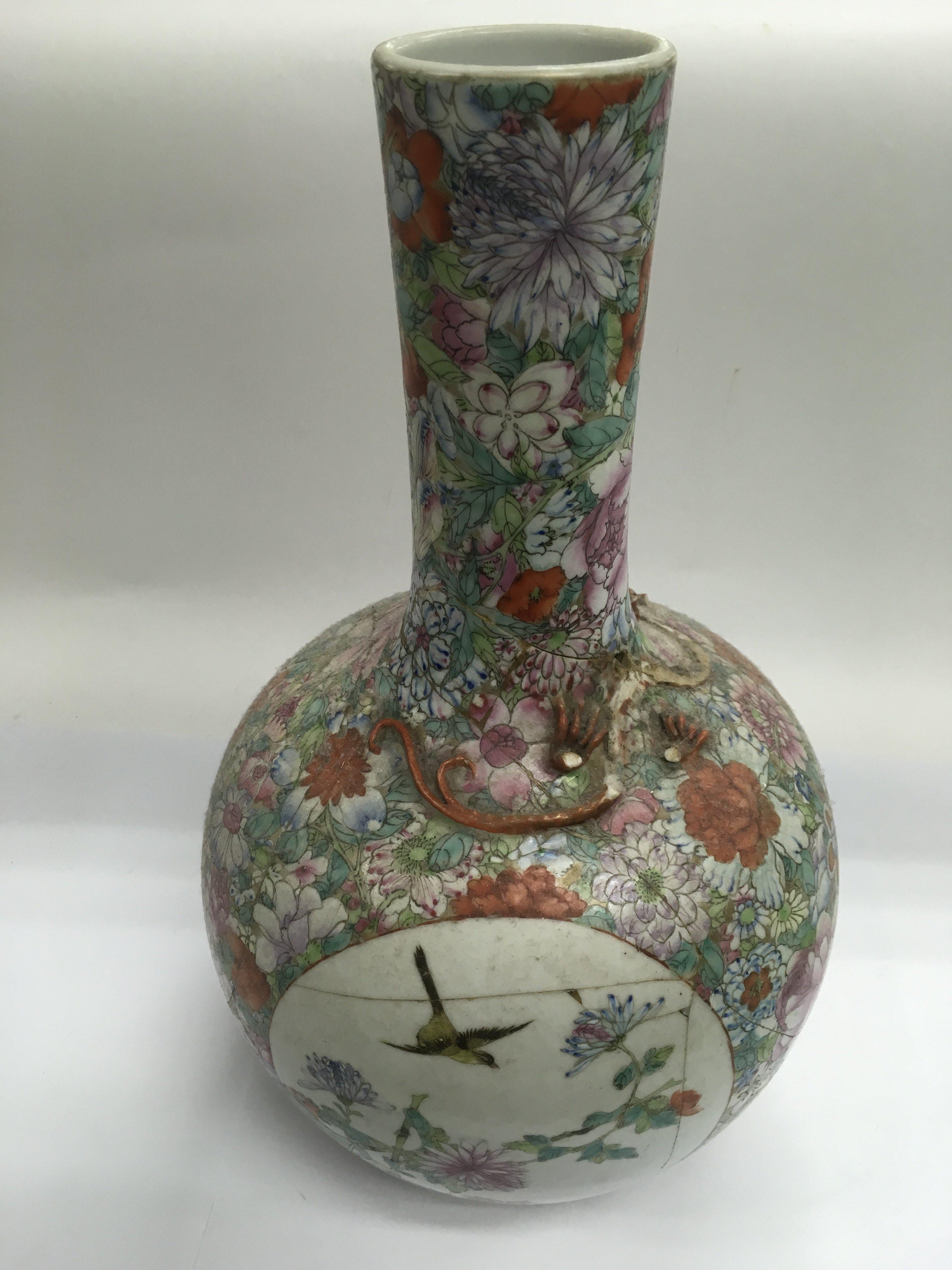 A Chinese bottle vase with hand painted panels depicting birds and flowers, approx height 40cm, a/