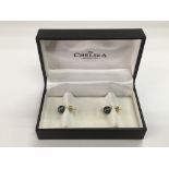 A pair of 18ct gold black pearl ear studs, approx