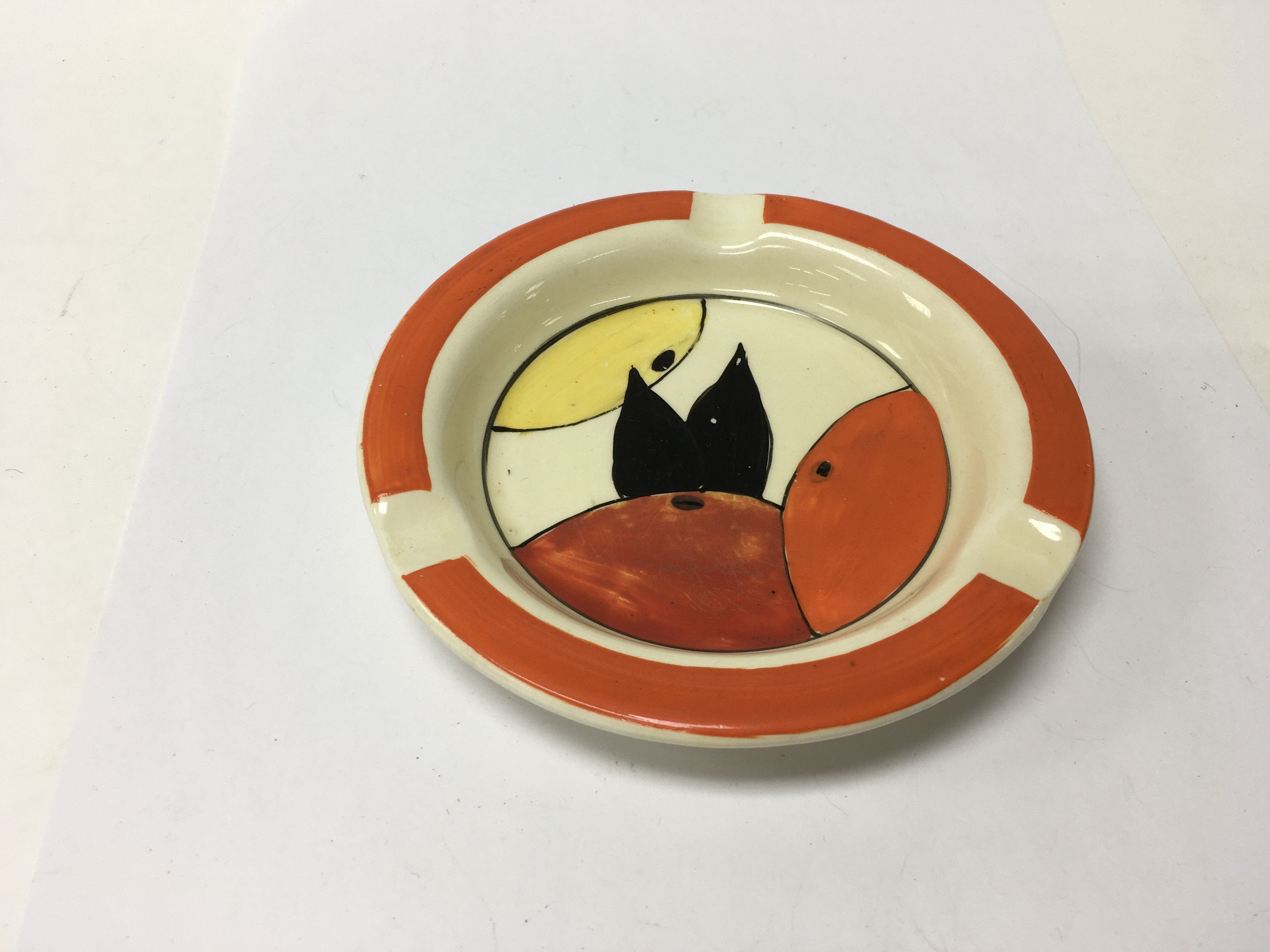 A Clarice Cliff ash tray orange and lemon 12 cm