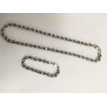 A silver rope chain necklace and bracelet.Approx 6