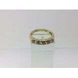 An 18ct gold five stone diamond ring, approx 1ct,