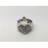 A modern style gents diamond ring, approx 5.6g and