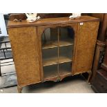 A walnut Display cabinet with a single glazed door