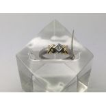 A 14ct white and yellow gold ring set with a princ