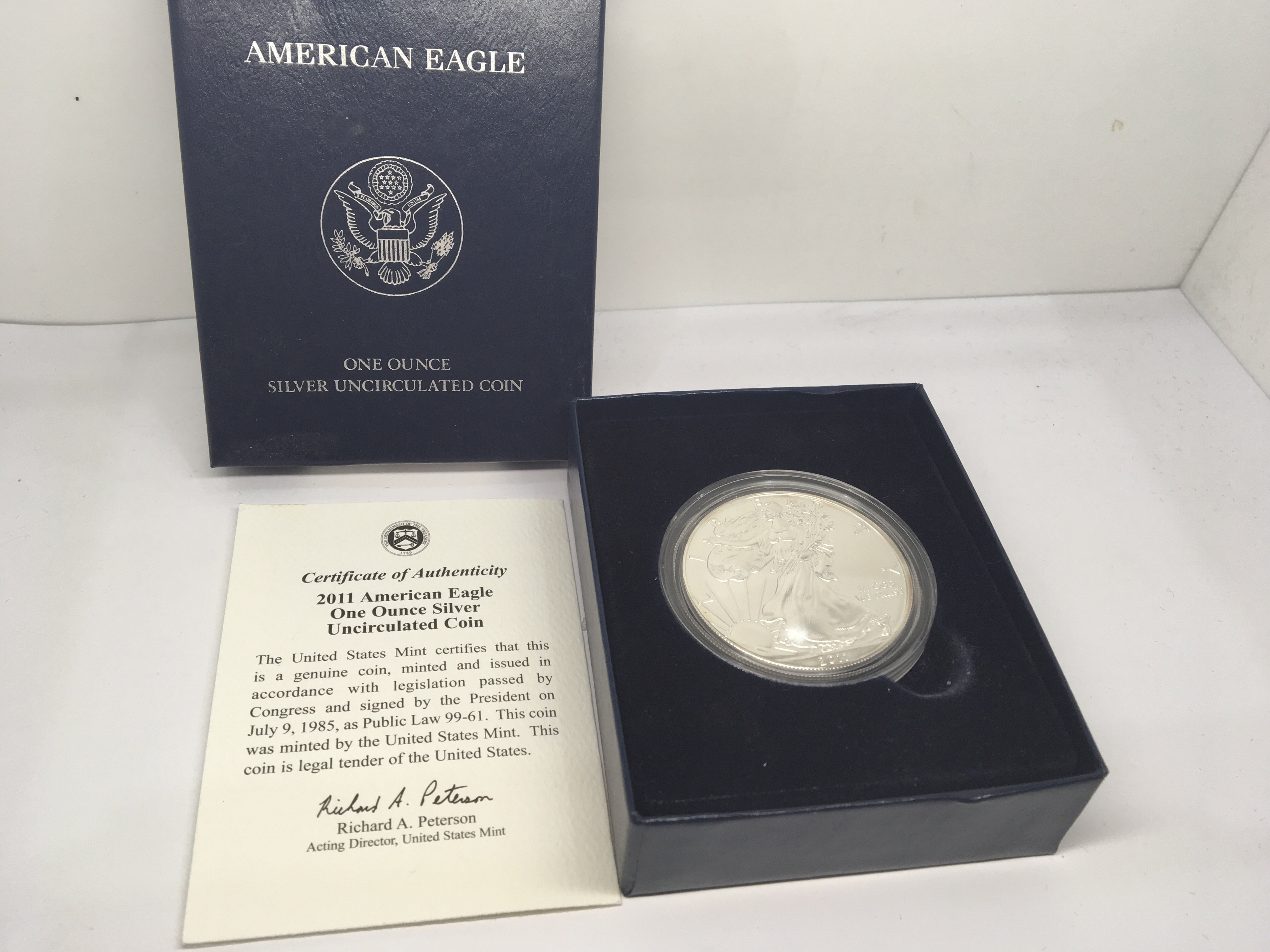 A 2011Burnished Uncirculated one ounce Silver (9.9