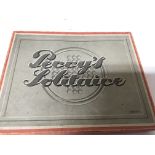 A rare boxed Percys Solitaire in a fitted box with rare smaller handmade marbles 1/2 inch attributed