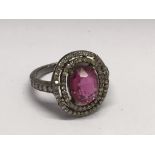 A diamond and pink tourmaline cluster ring, approx
