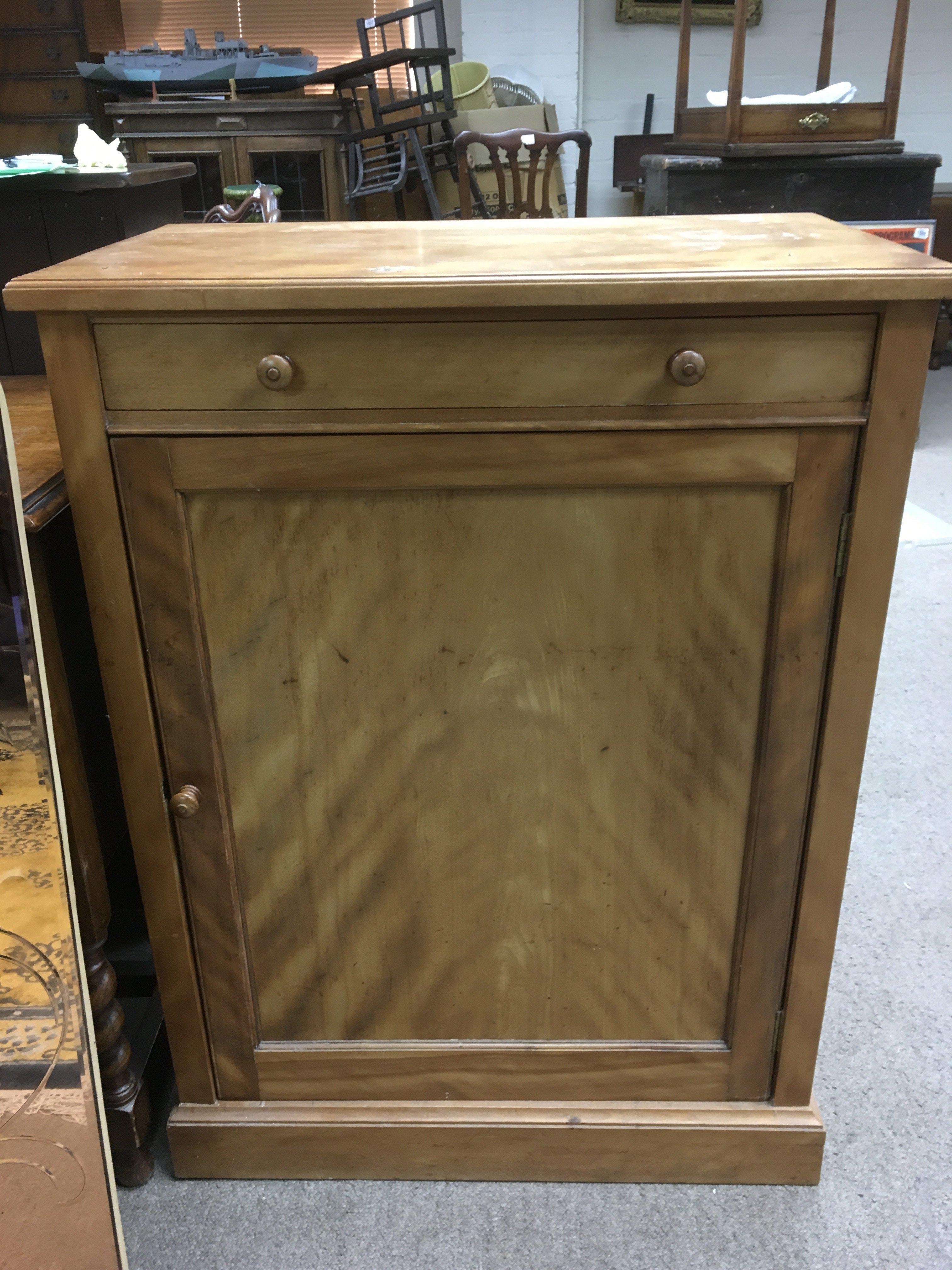 A satinwood cabinet buy Holland & Sons, approx 67cm x 91cm x 41cm.