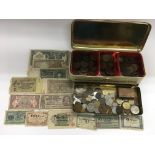 Two tins of GB and foreign issue coins and bank no