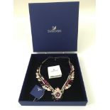 A boxed Swarovski coloured crystal necklace