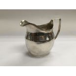 A Georgian silver jug, London 1806.