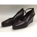 A pair of Biba wedge shoes in maroon, size 40.