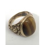 A gent's, 9ct gold and Tiger's Eye signet ring.App