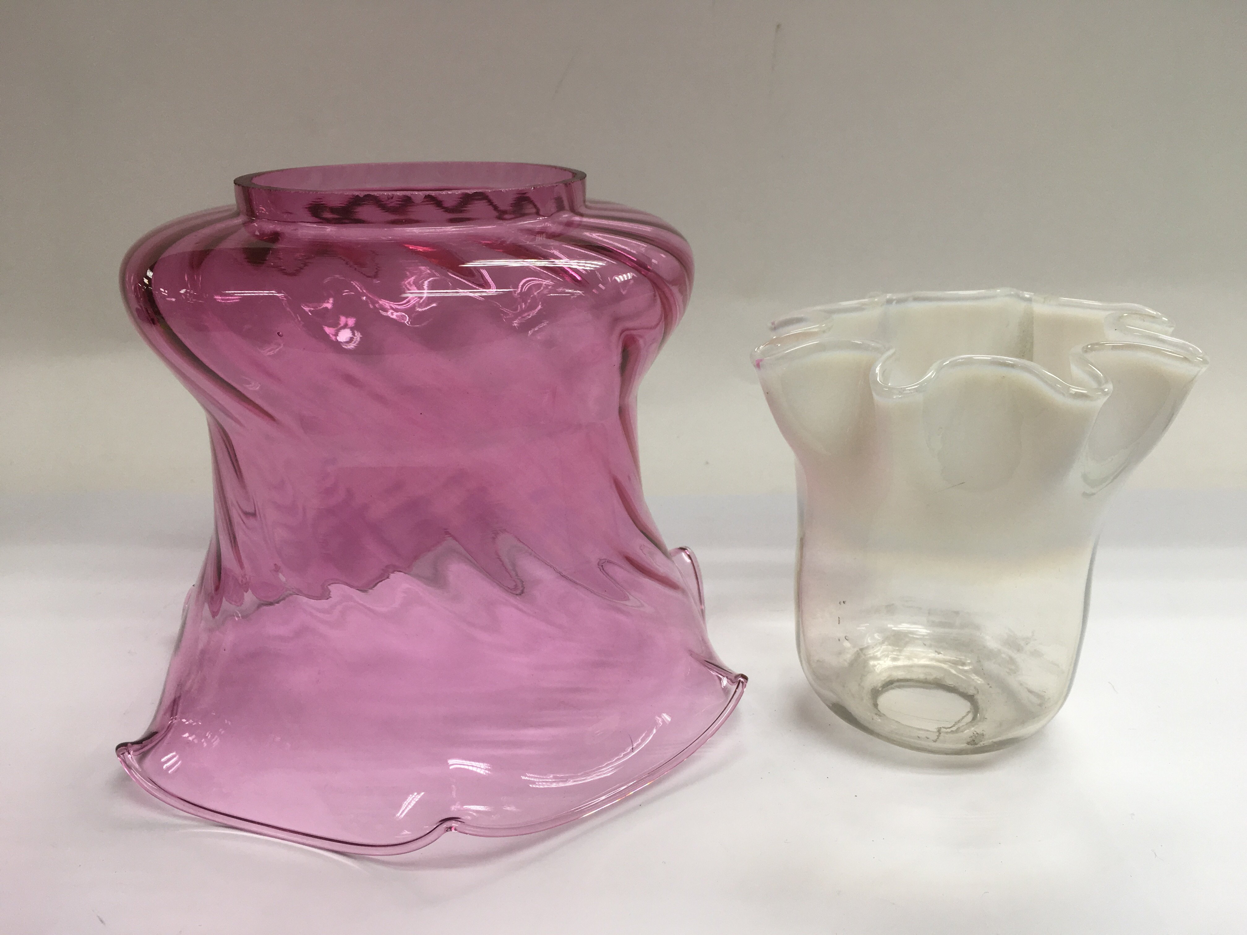 A cranberry glass shade, approx height 17cm and a