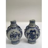Two, Chinese blue and white moon flasks, painted w