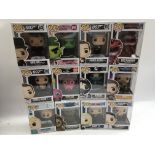 A collection of boxed Funko pops, mint and boxed
