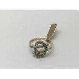 An unusual 14ct gold diamond set ring, approx 3.1g