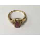 A 9 ct gold ring inset with ruby and diamonds size