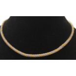 A Middle Eastern, two tone gold twist rope necklac