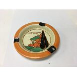 A Clarice Cliff ash tray decorated with the house
