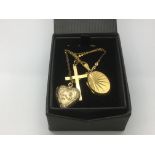 Two lockets and a crucifix, gold and silver.