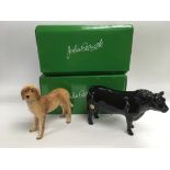 Two boxed Beswick animal figures comprising a dog