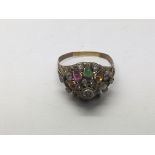 A 14k gold multi stone ring, approx 4.3g and appro